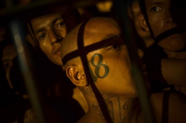 Members of a gang known as Mara 18 crowd into cells at the Izalco jail in Sonsonate, El Salvador.