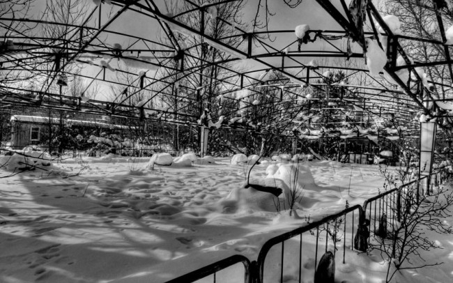 Snow-covered dodgems at the fairground