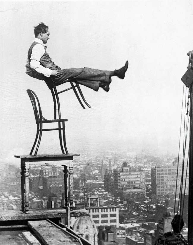Man Balancing atop 20-Story Building