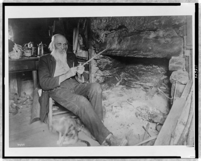 Mountaineer whittling Creator(s): Barnhill, Wm. A. , photographer Date Created/Published: c1920.
