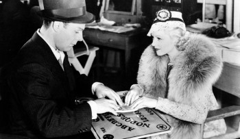 1936: Actors Brian Donlevy and Claire Trevor try out a Ouija board while on break from filming Human Cargo. | (AP Photo) found at http://theweek.com/articles/451347/secret-ouija-board