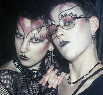 A portrait of two goth women posing in Camden Palace.