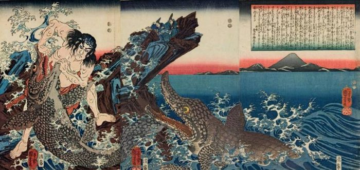Title: Kamakura Shôgun Yori-ie-kyô Kotsubo-no-hama ni ryôsen to etc. Description: Asahina Saburô Yoshihide struggling with two crocodiles on the seashore, watched by the Shôgun Yori-ie from a rock, with Mt. Fuji in the background 